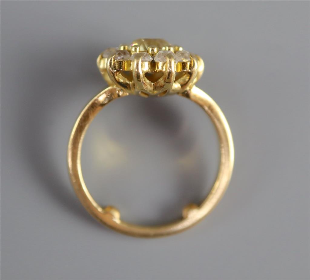 A modern 18ct gold and diamond cluster ring,